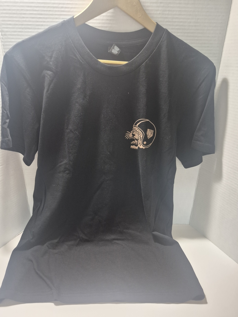 Black Graphic Tee with Small Cream Skull Helmet Graphic